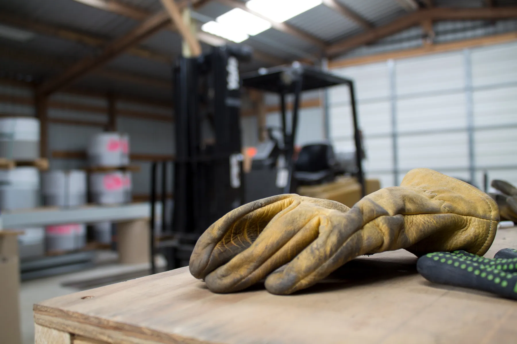 worker gloves in a metal workshop